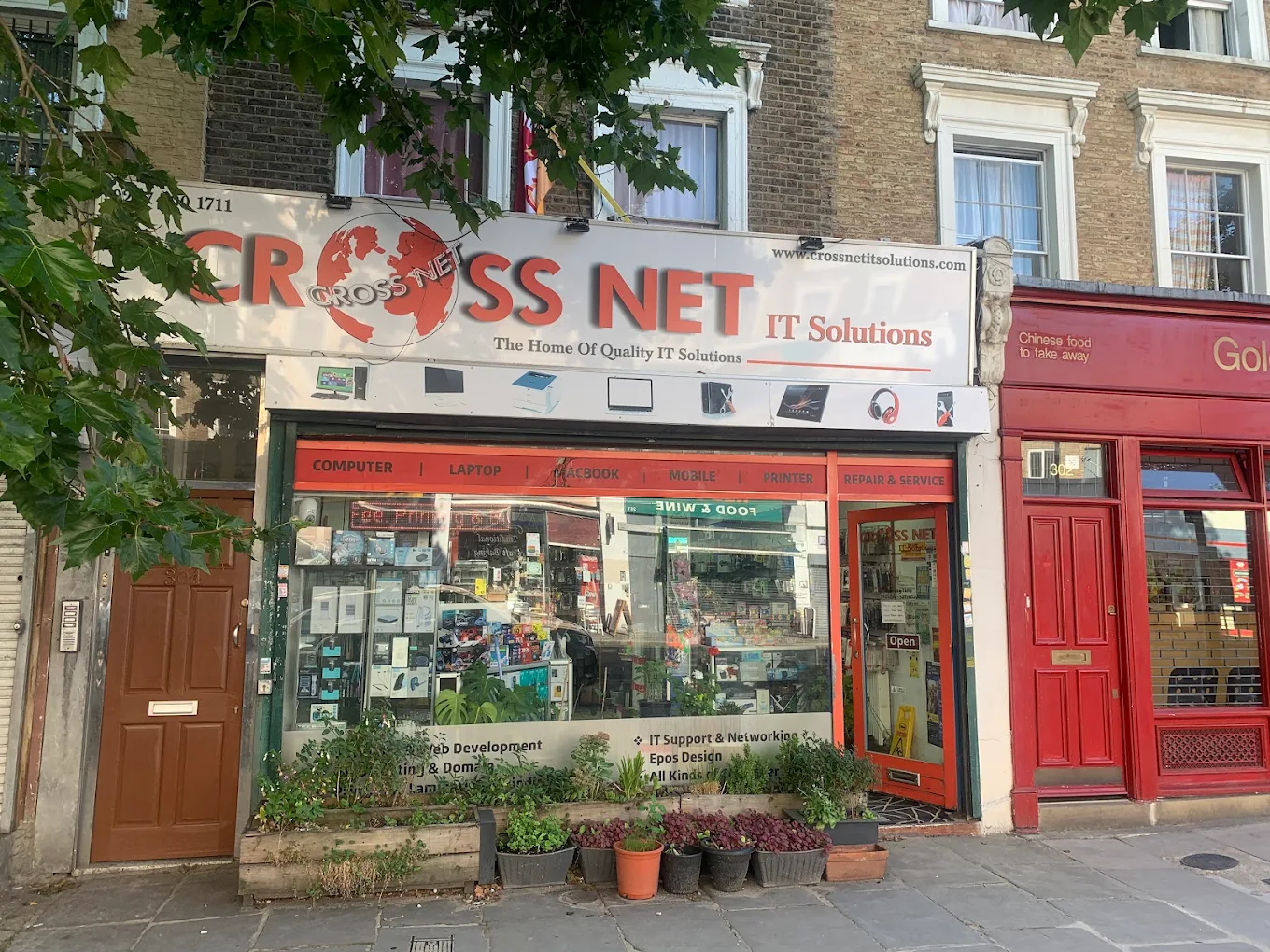 Crossnet IT Solutions storefront in daylight